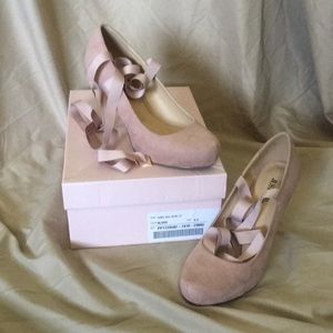 Blush lace up heels.